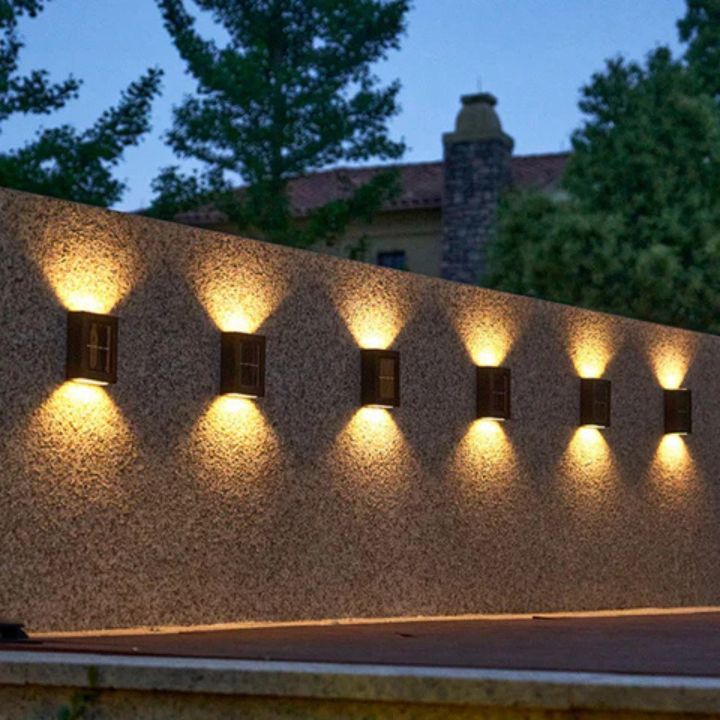 Solar wandlamp met dubbele schaduw