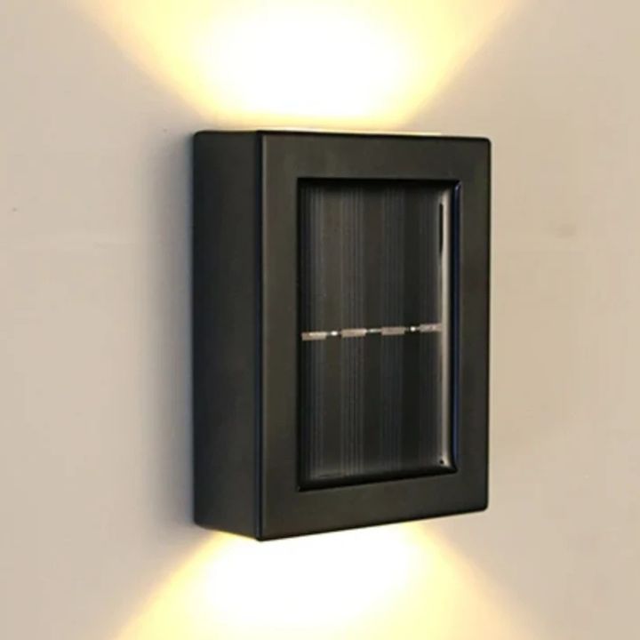 Solar wandlamp met dubbele schaduw