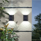 Solar wandlamp met dubbele schaduw