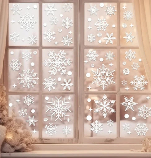 Kerstdecoratie op een raam met dubbelzijdig zichtbare motieven