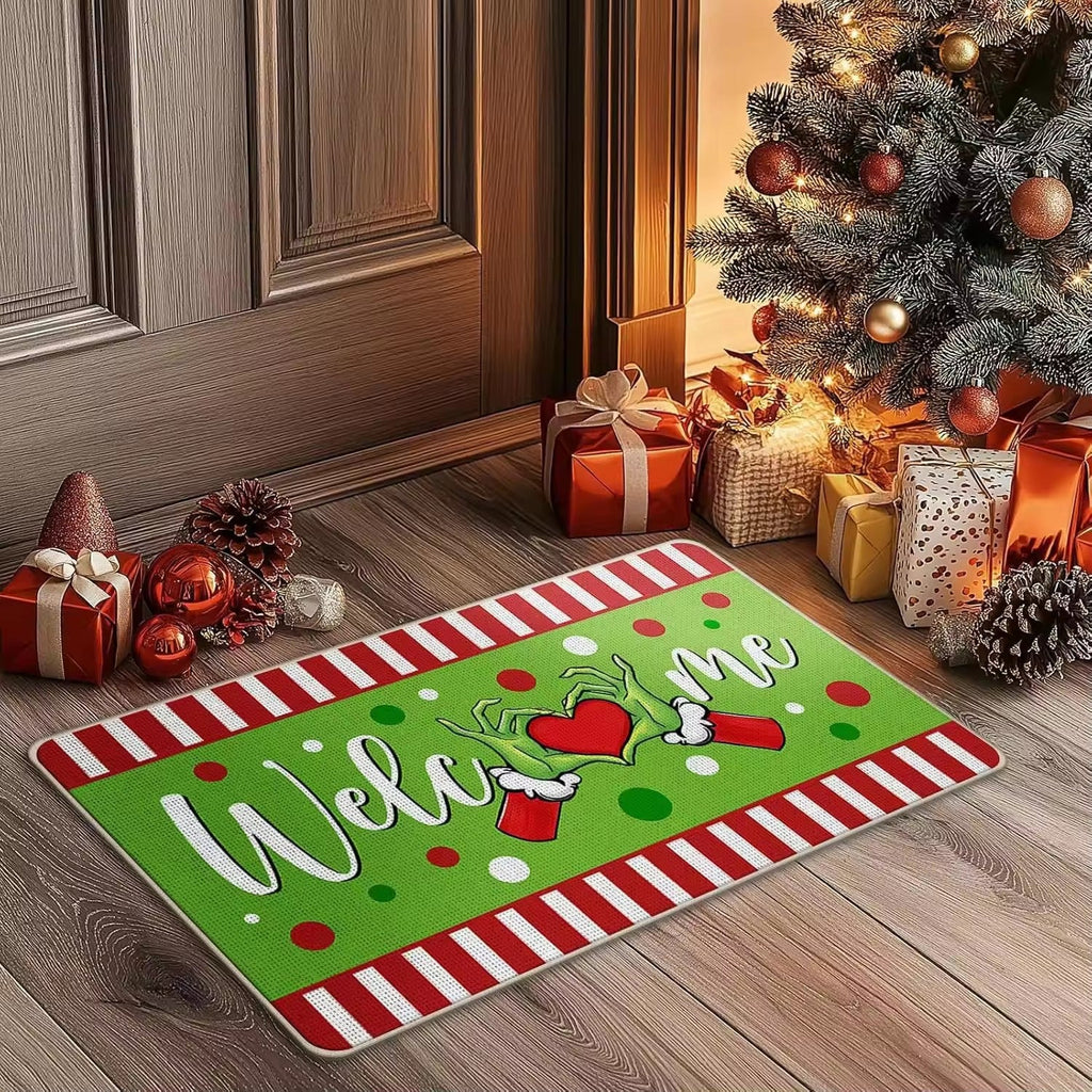 Detail van het kerstmotief op de welkomstmat