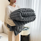 Pluche deken als comfortabele bankdeken