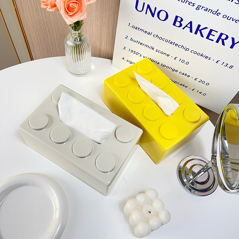 Moderne aan de muur gemonteerde tissuehouder met speels blokontwerp