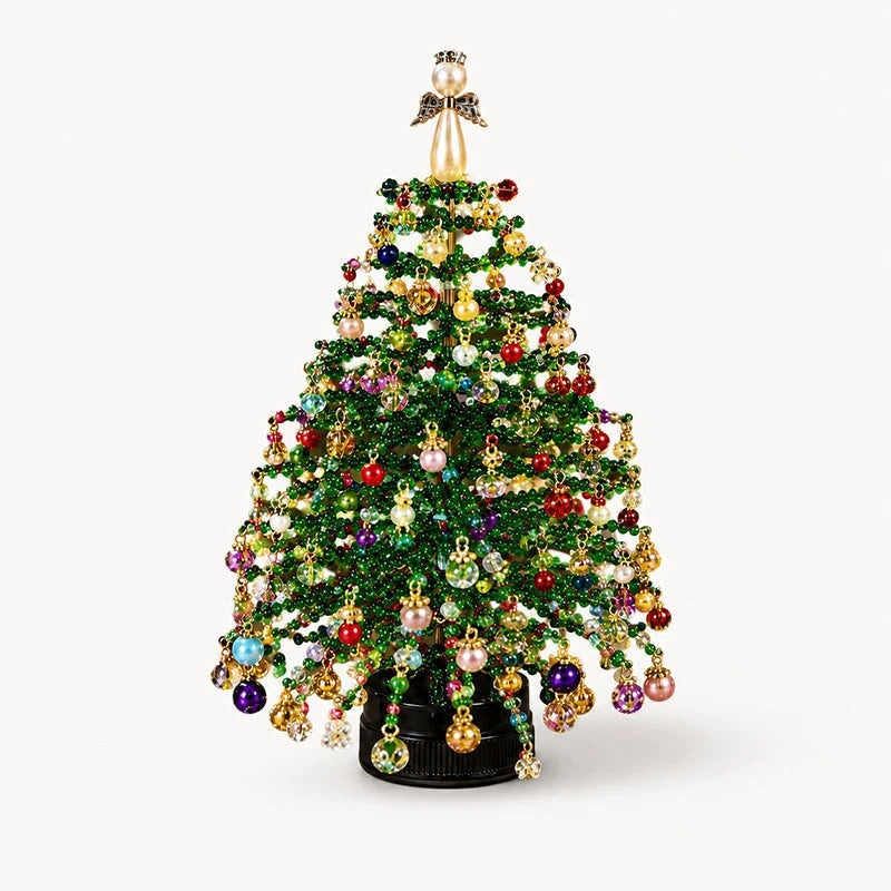Onderdelen van de DIY parel kerstboom kit overzichtelijk in beeld