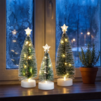 Kleine kerstboompjes met warmwit licht als tafeldecoratie