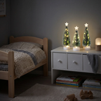 Verlichte mini-kerstboompjes voor een warme kerstsfeer