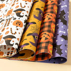 Cadeau ingepakt met Halloween papier vol geesten en pompoenen