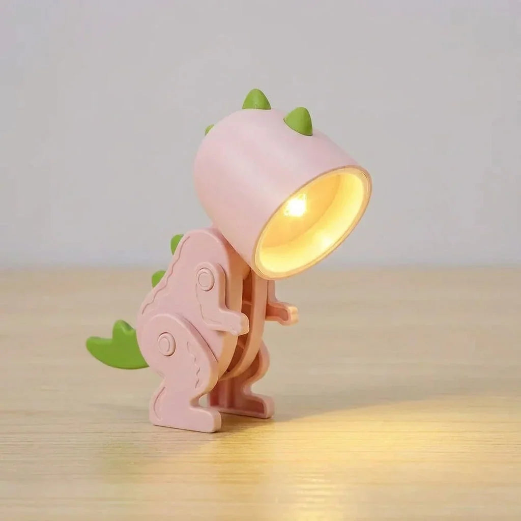 Dinosaurus-bureaulamp voor kinderen op een bureau